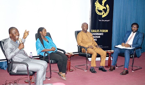  Nicholas Issaka Gbana (left), Development Economist, making remarks during the panel discussion. With him are Grace Asantewaa Twumasi (2nd from left), CEO of Dezigner Foods and Spices; Baba Adongo (2nd from right), Country Representative, Footprints Bridge International, and Lom Ahlijah, Executive Member of the Eagles Forum. Picture: Maxwell Ocloo